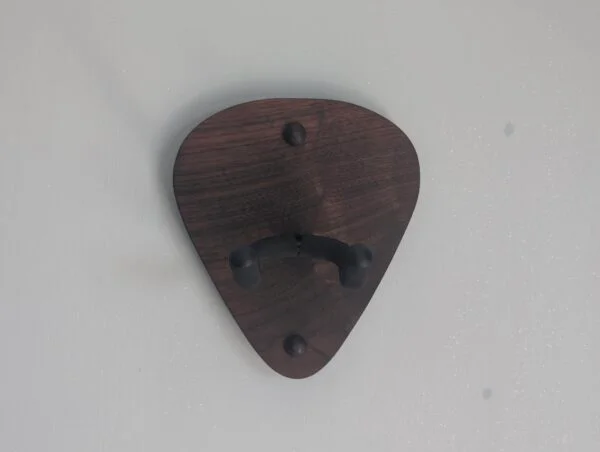 Solid Black Walnut Plectrum Guitar Mount - no guitar, straight image, closeup