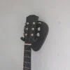 Solid Black Walnut Plectrum Guitar Mount - with guitar, angled image, closeup